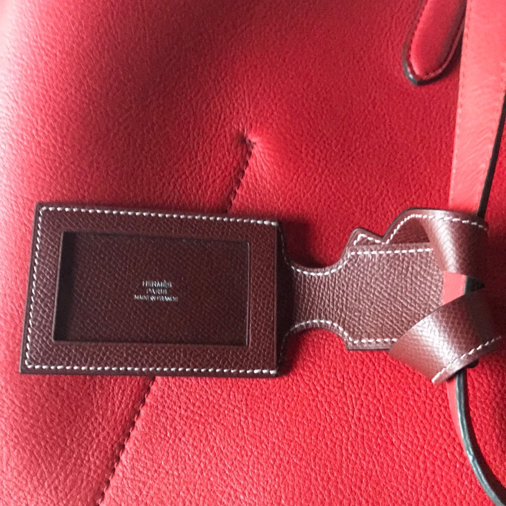 Hermès luggage tag with original box, never used